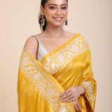 Yellow Silk Saree With White Floral Embroidered Border close up