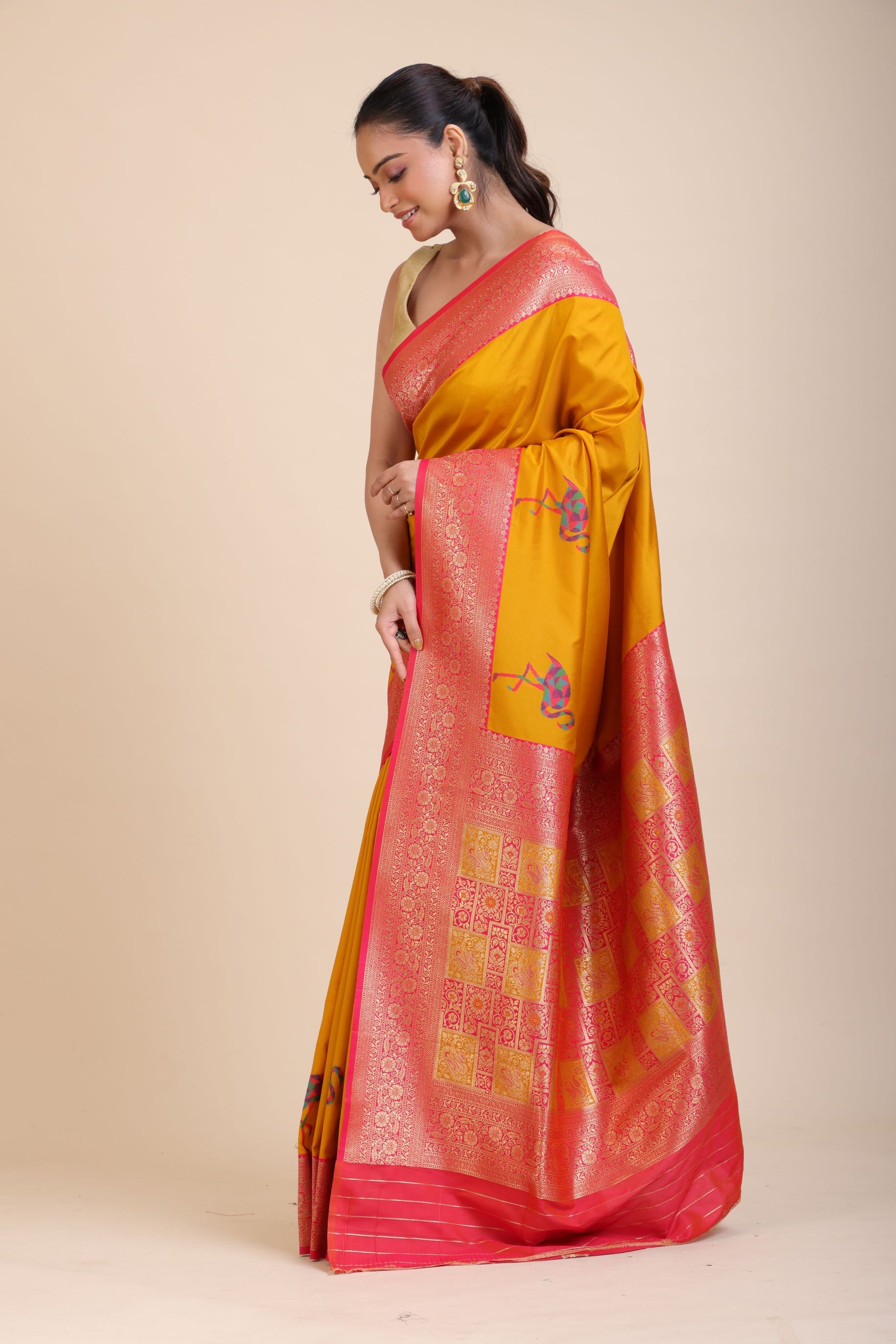 Yellow Soft Silk Saree With Red and Golden Border Front
