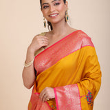 Yellow Soft Silk Saree With Red and Golden Border Close Up
