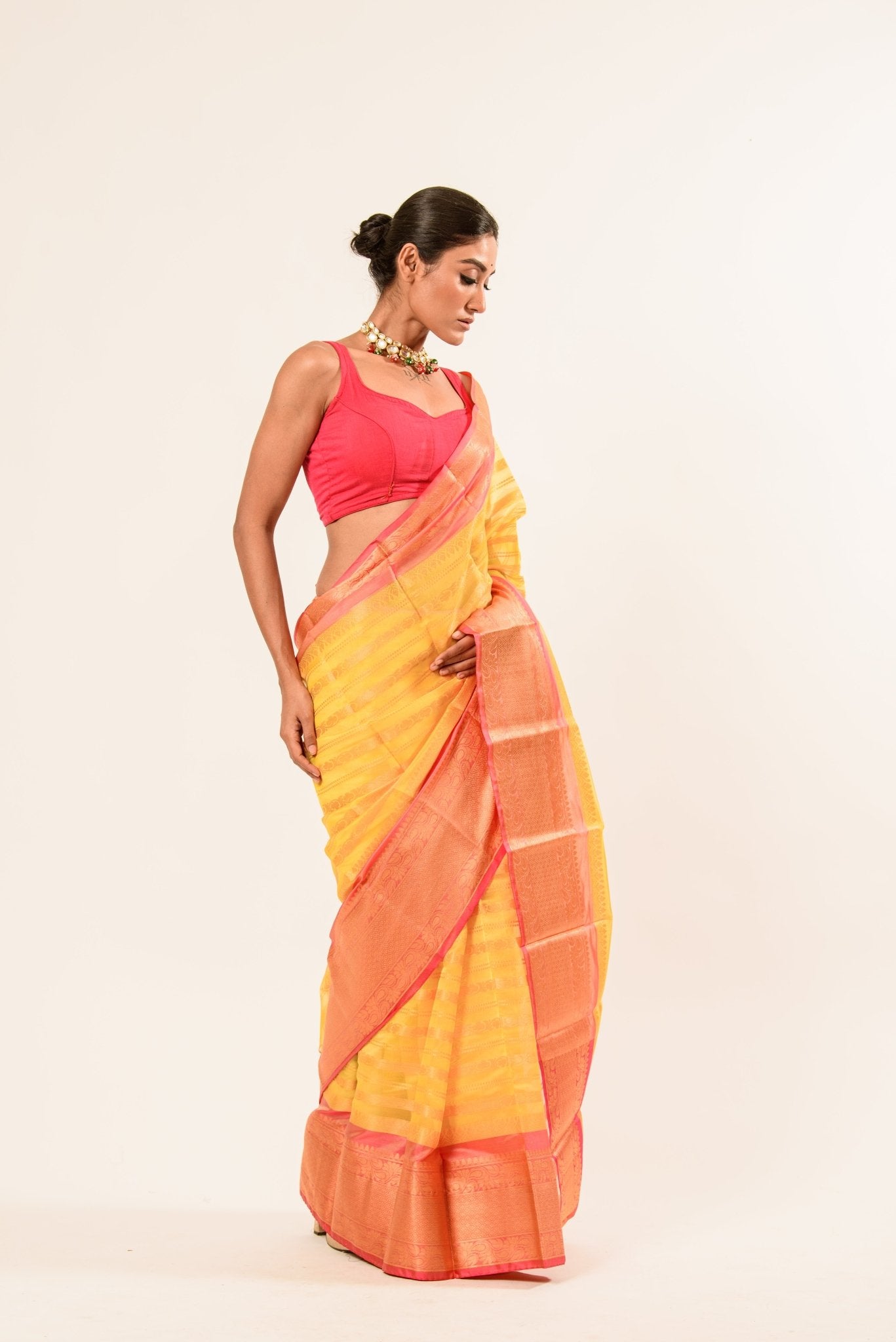 Yellow with Pink and Gold Border Handloom Organza Saree