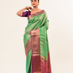 Forest Green Kanjivaram Silk Saree with Magenta Border and all over Zari - Anvi Couture