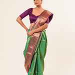 Forest Green Kanjivaram Silk Saree with Magenta Border and all over Zari - Anvi Couture