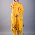 front view showing straight-cut silhouette and green embroidered yoke