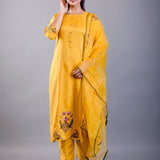 front view showing straight-cut silhouette and green embroidered yoke