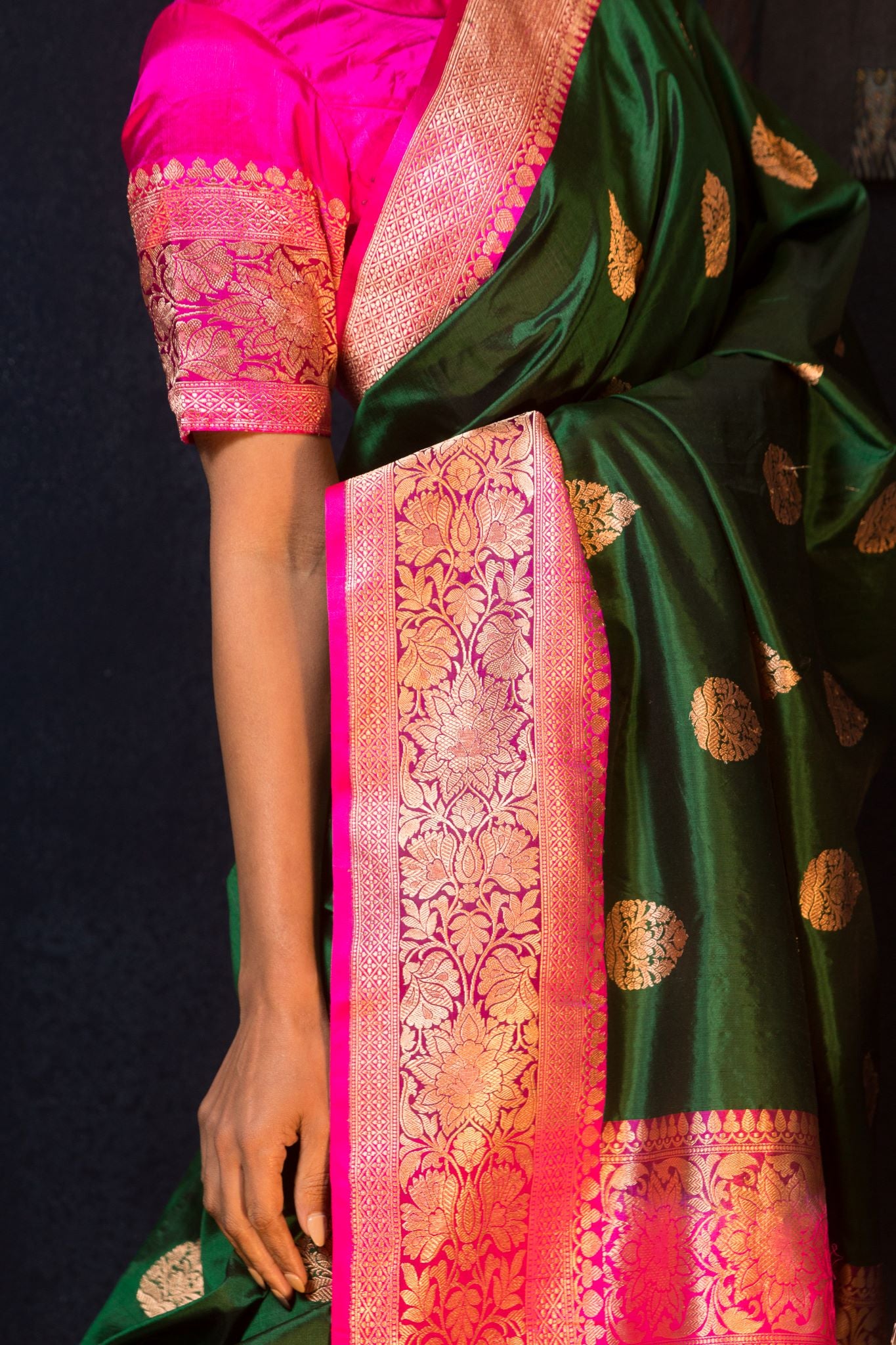 Green Katan Banarasi Silk Saree Embellished with Golden Floral Motifs and Pink Border - Anvi Couture