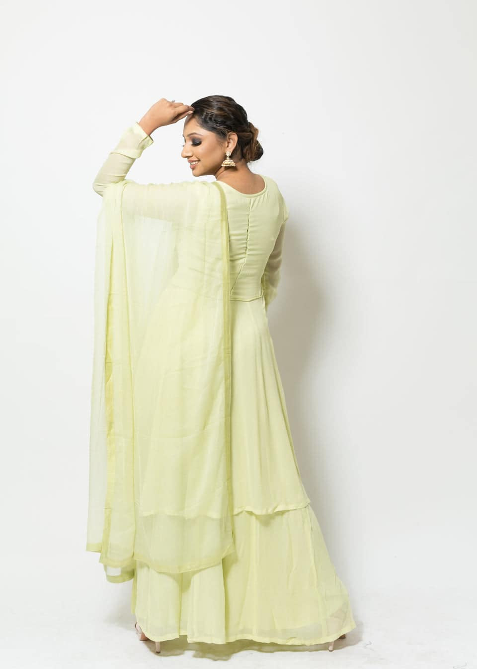 Festive light green georgette Sharara set with embroidered Kurta, round neck, and flowing design