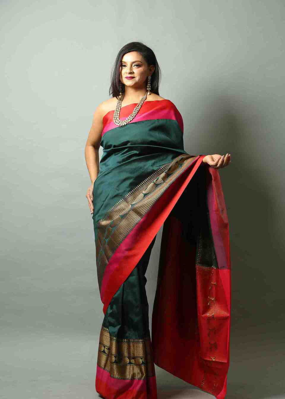 Peacock Green Silk Saree with Floral work along the Border -Front