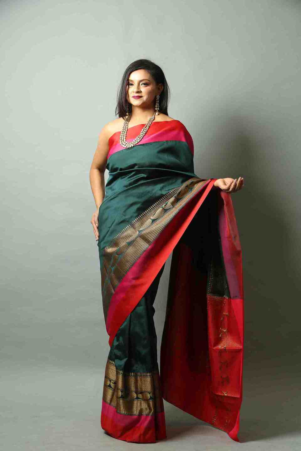 Peacock Green Silk Saree with Floral work along the Border -Front