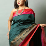 Peacock Green Silk Saree with Floral work along the Border -Close
