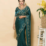 Teal Blue Crepe Saree with stonework and floral embroidery - Anvi Couture