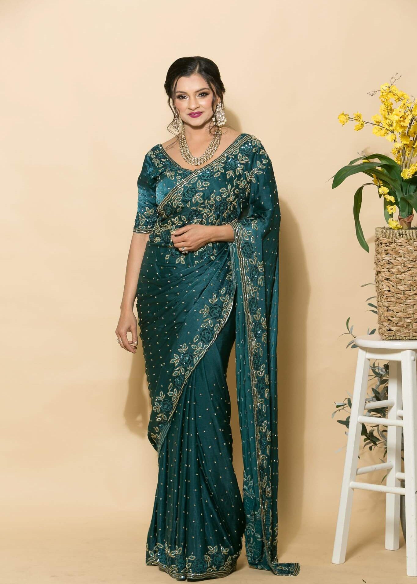 Teal Blue Crepe Saree with stonework and floral embroidery - Anvi Couture