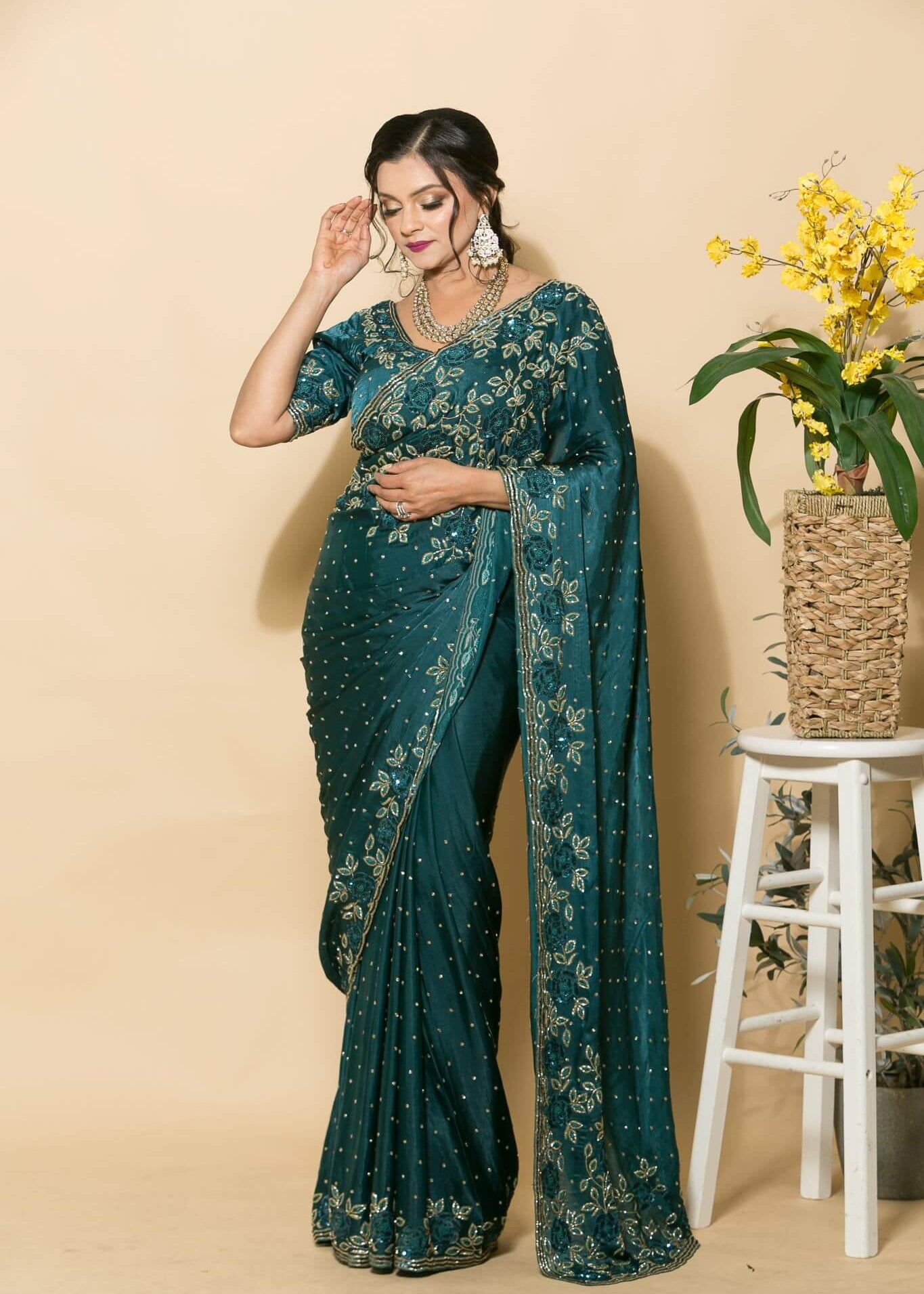 Teal Blue Crepe Saree with stonework and floral embroidery - Anvi Couture