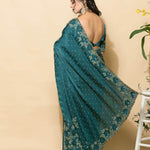 Teal Blue Crepe Saree with stonework and floral embroidery - Anvi Couture