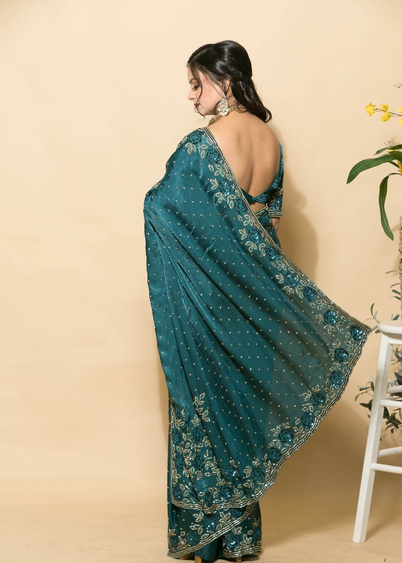 Teal Blue Crepe Saree with stonework and floral embroidery - Anvi Couture