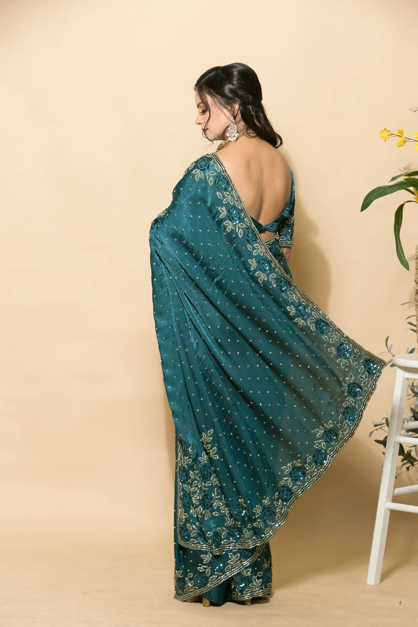 Teal Blue Crepe Saree with stonework and floral embroidery - Anvi Couture